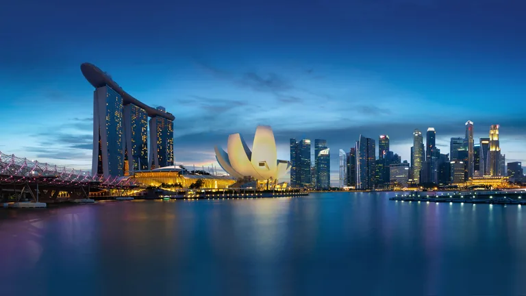 Marina Bay, illustrative photograph: Marina Bay Sands and the ArtScience Museum lit at blue hour across the water of the bay