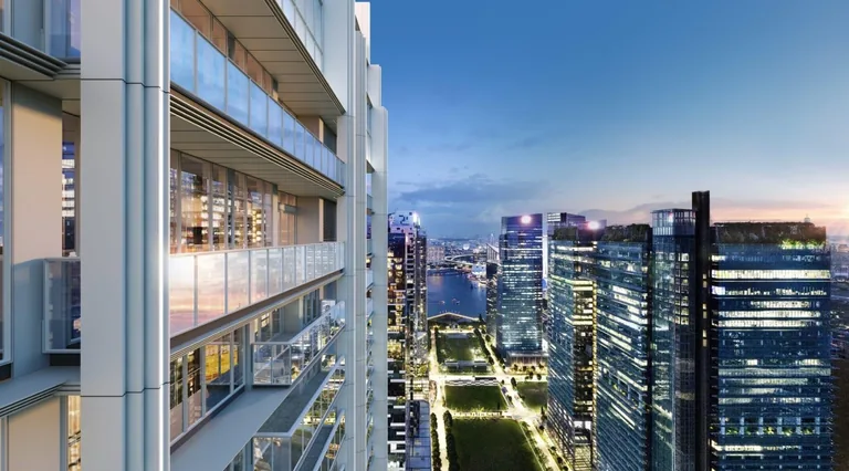 W Residences Marina View, artist&rsquo;s impression: the view along the balconies of the tower towards the lit towers of the financial district at dusk